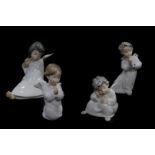 A Lladro porcelain figure of a seated cherub, and three further cherubs, one praying, another in con