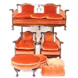 An Edwardian Chippendale style mahogany double framed salon suite, comprising two seater sofa, with