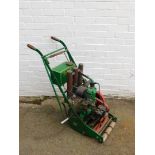 A Stuart Turner Ltd petrol lawn mower, No 6937.