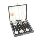 A set of six silver thistle top coffee spoons, cased, Birmingham 1989, 1.54oz.