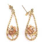 A pair of 9ct bi-colour gold drop earrings, cast with roses, 3.5g.