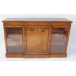A Victorian figured and burr walnut veneered breakfront credenza, with mahogany cross banded and str