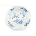 A Qing early 19thC blue and white porcelain plate, of octagonal form, painted with flowers, 22.5cm d