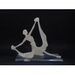 An Art Deco style fibre glass figure of a dancer, modelled in a mannerist, elongated standing pose,