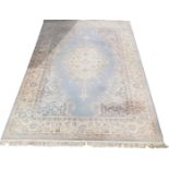 A Super Keshan hand made carpet, with a floral pattern, on a cream ground, 263cm wide.