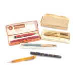 A Waterman's lady's writing set, Platignum Club Gift Set, and a Parker 12ct rolled gold fountain pen