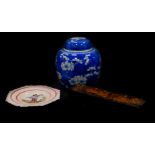 A Chinese porcelain blue and white ginger jar and cover, decorated with prunus blossom against a cra