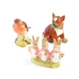 A Beswick figure of a robin, no 980., Beswick Beatrix Potter figure group modelled as Flopsy, Mopsy