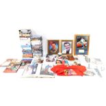 Tom Selleck. A collection of memorabilia, to include DVDs, videos, a wall clock, signed photographs,