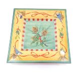 A Lenox pottery square dish decorated in the Winter Greetings pattern, designed by Catherine McClung