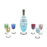 A Venetian mid century colour glass liqueur set, with silver resist decoration depicting a gondola,