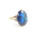 A 9ct gold and blue topaz ring, the oval cut stone approx 12cts, size R, 6.9g.