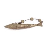 An early 20thC Eastern metal articulated fish, heavily cast and set with scales, with a chain hanger