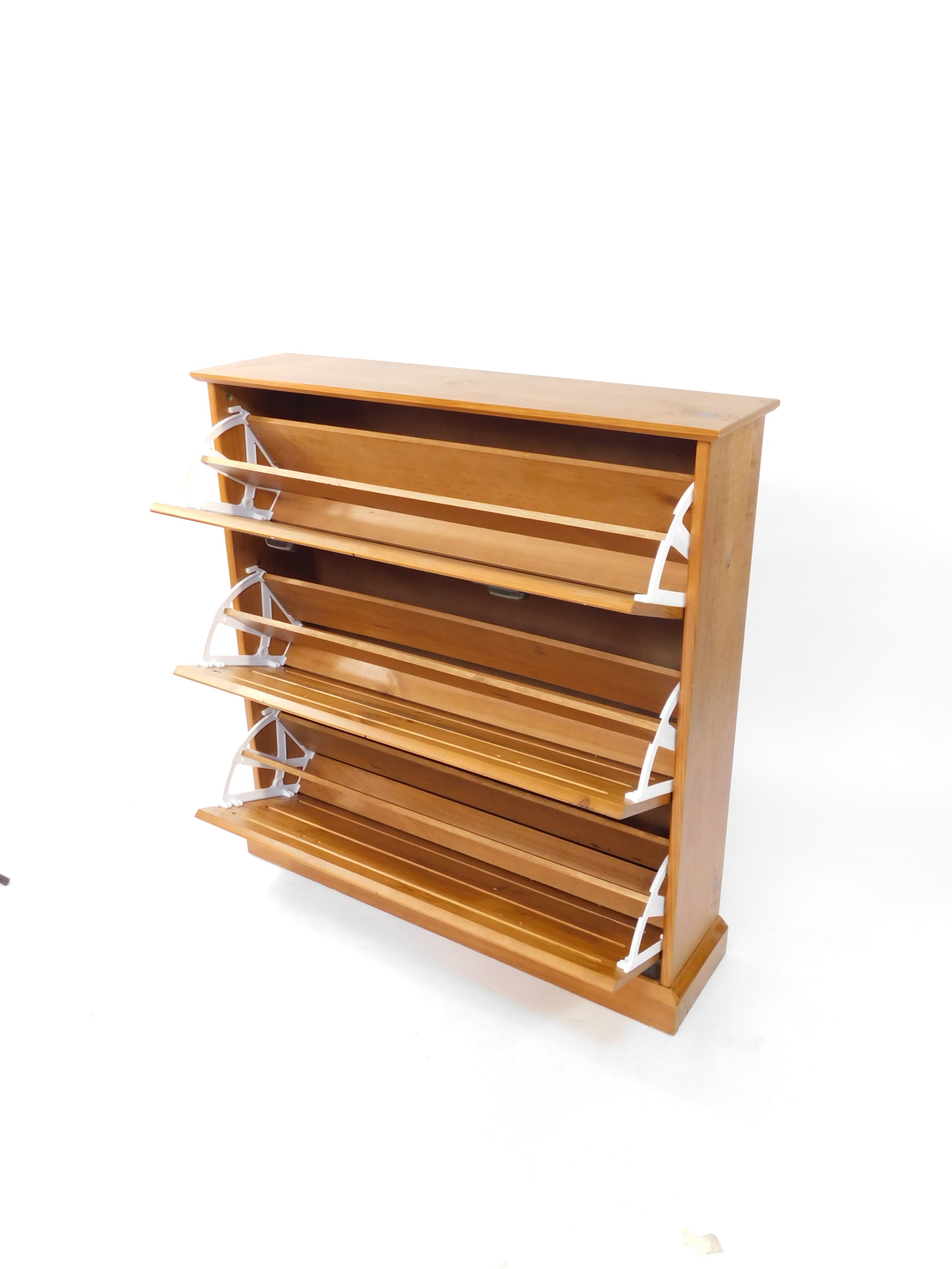 A 20thC pine shoe rack, of rectangular form with three hinged cupboards to the front on a block base - Image 2 of 2