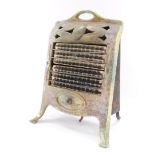 A vintage Reno heater, in a shaped enamel and metal case, with front grill, on shaped feet, labelled