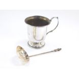 A George VI silver cup, presentation engraved Birmingham 1937., and an Edward VII silver apostle sug