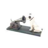 A replica cast iron HMV money box, modelled as seated dog looking to the horn of a gramophone, raise