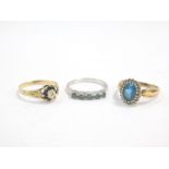 A 9ct gold and diamond ring in a surround of sapphires, size M, and two further 9ct gold and gem set