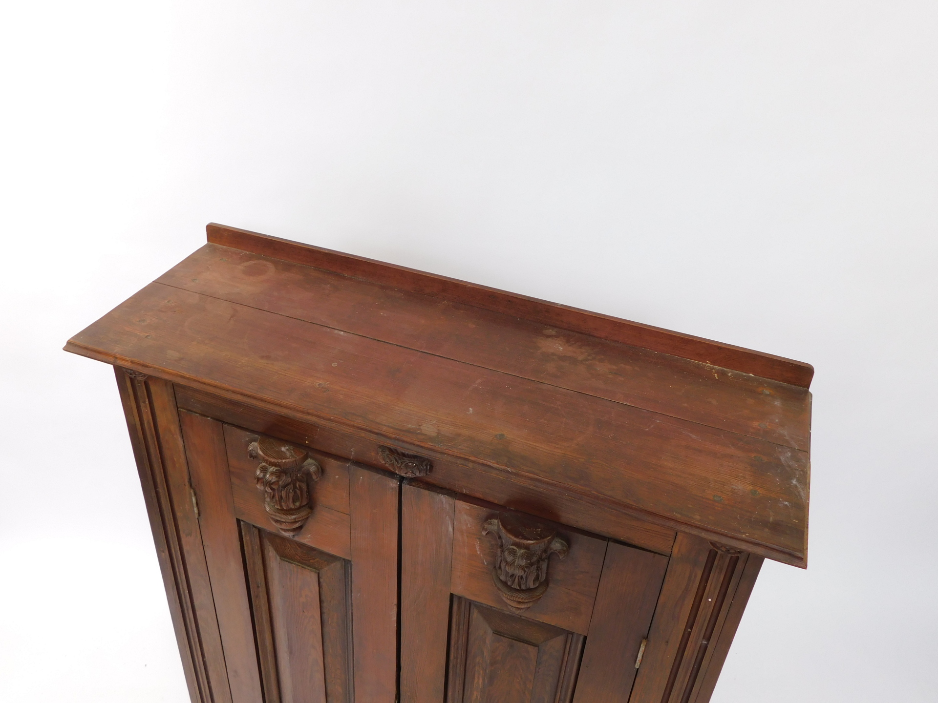 A 19thC ecclesiastical style pine vestment type cupboard, with carved semi circle acanthus leaf moul - Image 2 of 3