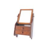 A Victorian style hanging mirror, of rectangular form with metal adjusters above two drawers with in