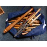 Hand tools with polished wooden handles, to include chisels, etc, in a canvas bag. (a quantity)