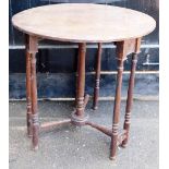 A 19thC oak occasional table, with circular top, with turned legs and stretchers, 67cm high, 70cm di