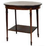 An Edwardian mahogany and boxwood strung occasional table, the oval top raised on square tapering le