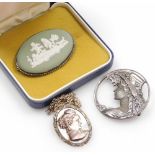 A small group of jewellery, to include an Art Nouveau silver circular brooch depicting a lady in hea