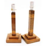 A pair of mid-century Art Deco style walnut table lamps, each of square design on stepped bases, 36c