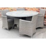 A six seater circular grey rattan outdoor table and four chairs, the table diameter 135cm.