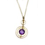 A 9ct gold pendant and chain, the small two tier circular pendant set with amethyst and seed pearls,