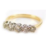 An 18ct gold five stone diamond ring, with five round brilliant cut diamonds, in each claw white gol