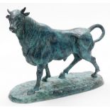 A contemporary hollow bronze figure of a standing bull, 35cm high, 42cm wide.