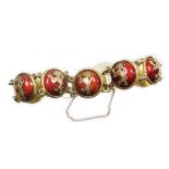 A Continental enamelled cabochon link bracelet, the bracelet formed of various circular links, each