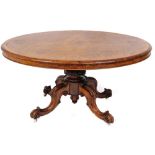 A fine Victorian burr walnut and marquetry breakfast table, with cross banded oval quarter veneered