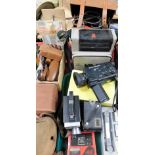 A group of camera equipment, to include a Bib video tape splicer, a Brownie camera, a Sanko video ca