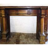 An Edwardian mahogany fireplace, carved with egg and dart floral moulding, over a dentil band and ha