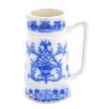 A Macintyre Burslam pottery blue and white milk jug, with Art Nouveau style flower decoration, 16cm