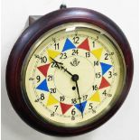 An RAF sector wall clock, the cream painted dial with red blue and yellow flag decoration and centra