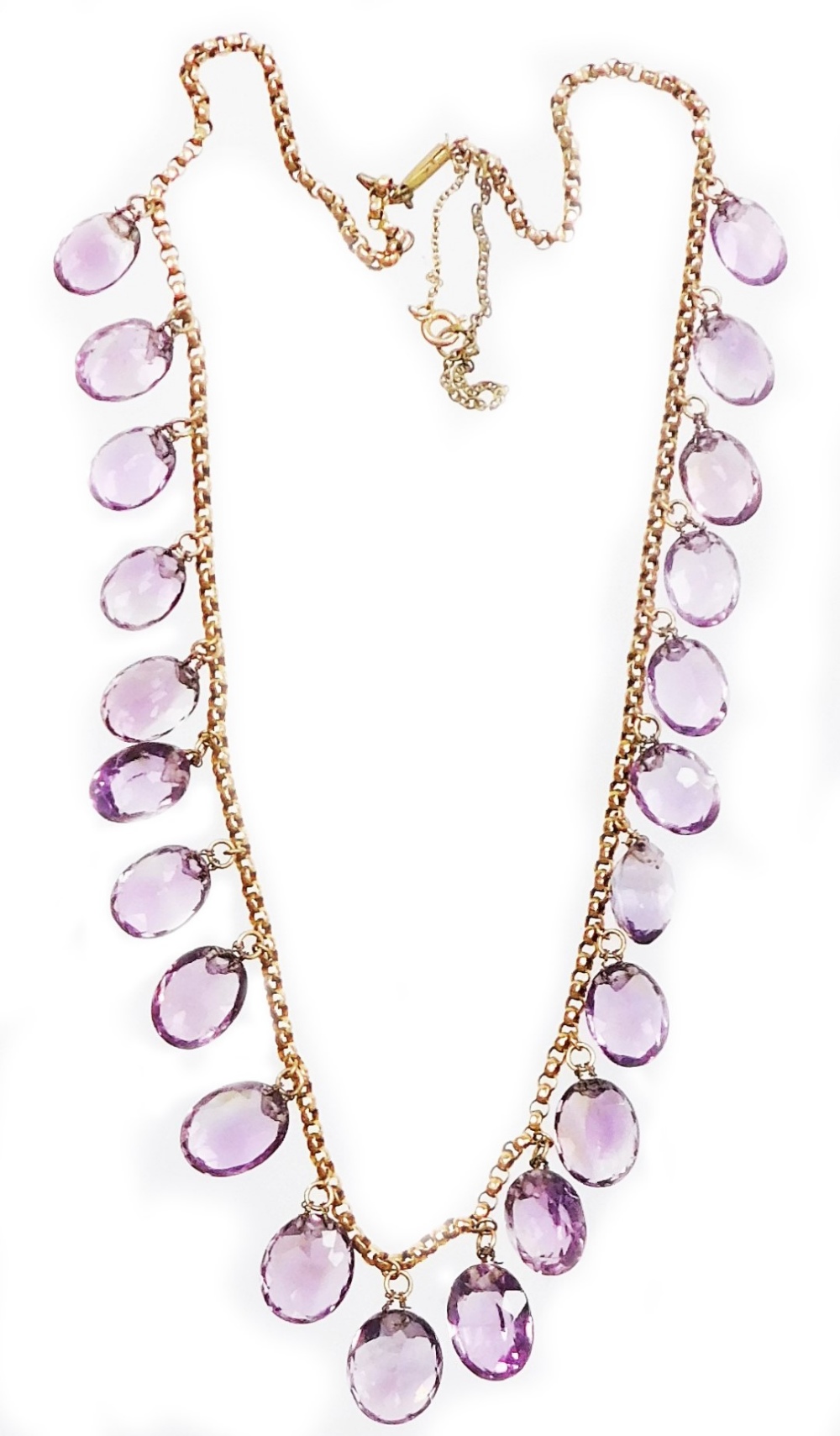 An Edwardian design amethyst graduated beaded necklace, set with twenty two oval cut amethysts, on a