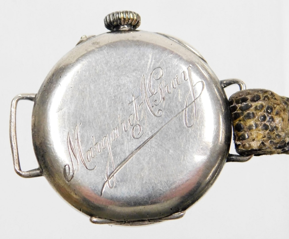 Two silver cased wristwatches, to include one with white enamel dial, gold marker points, with a Swi - Image 2 of 4