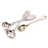 A pair of silver plated Fiddle pattern preserve spoons, and another. (3)