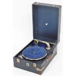 A cased vintage portable gramophone, in blue carry case.