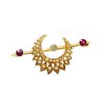 An Eastern inspired bar brooch, set with diamond, ruby and applied crescent moon and flower set seed