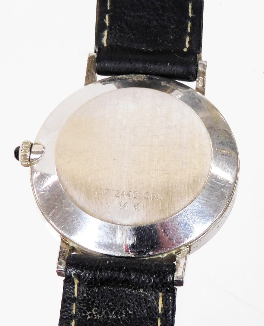 A Movado wristwatch, with circular watch face with blackened dial with tiny diamond set twelve point - Image 2 of 3