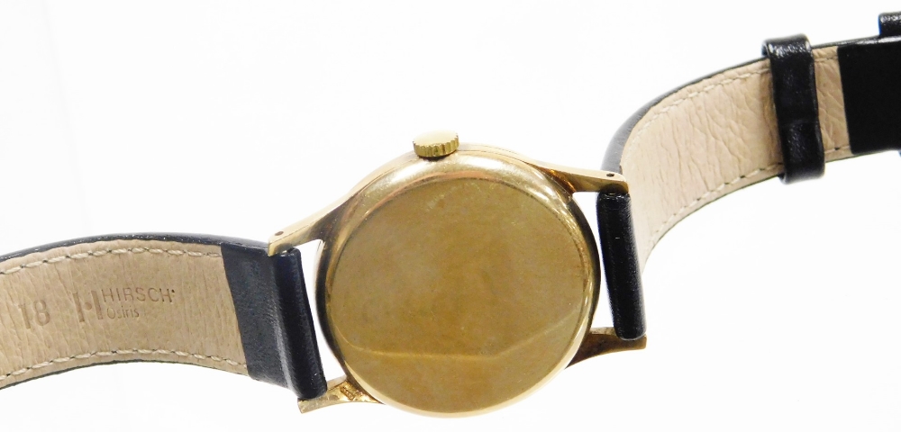 A Longines 9ct gold gentleman's wristwatch, with a cream coloured dial, in a 9ct gold casing, on a l - Image 2 of 4