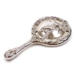 An early 20thC Art Nouveau style hand mirror, with shaped tear drop handle, heavily repousse decorat