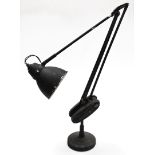 An angle poise lamp, silver and later painted in black, stamped Ekwipoz, 55cm high unextended.