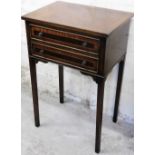 An early 19thC mahogany bedside cabinet, with a rectangular top, with marquetry inlaid banding, with