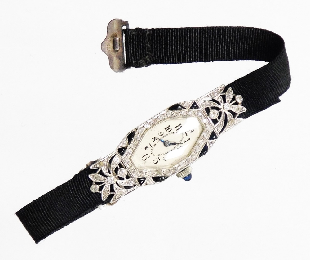 An early 20thC diamond set ladies cocktail watch, with a hexagonal shaped dial, in a white enamel fi - Image 2 of 4